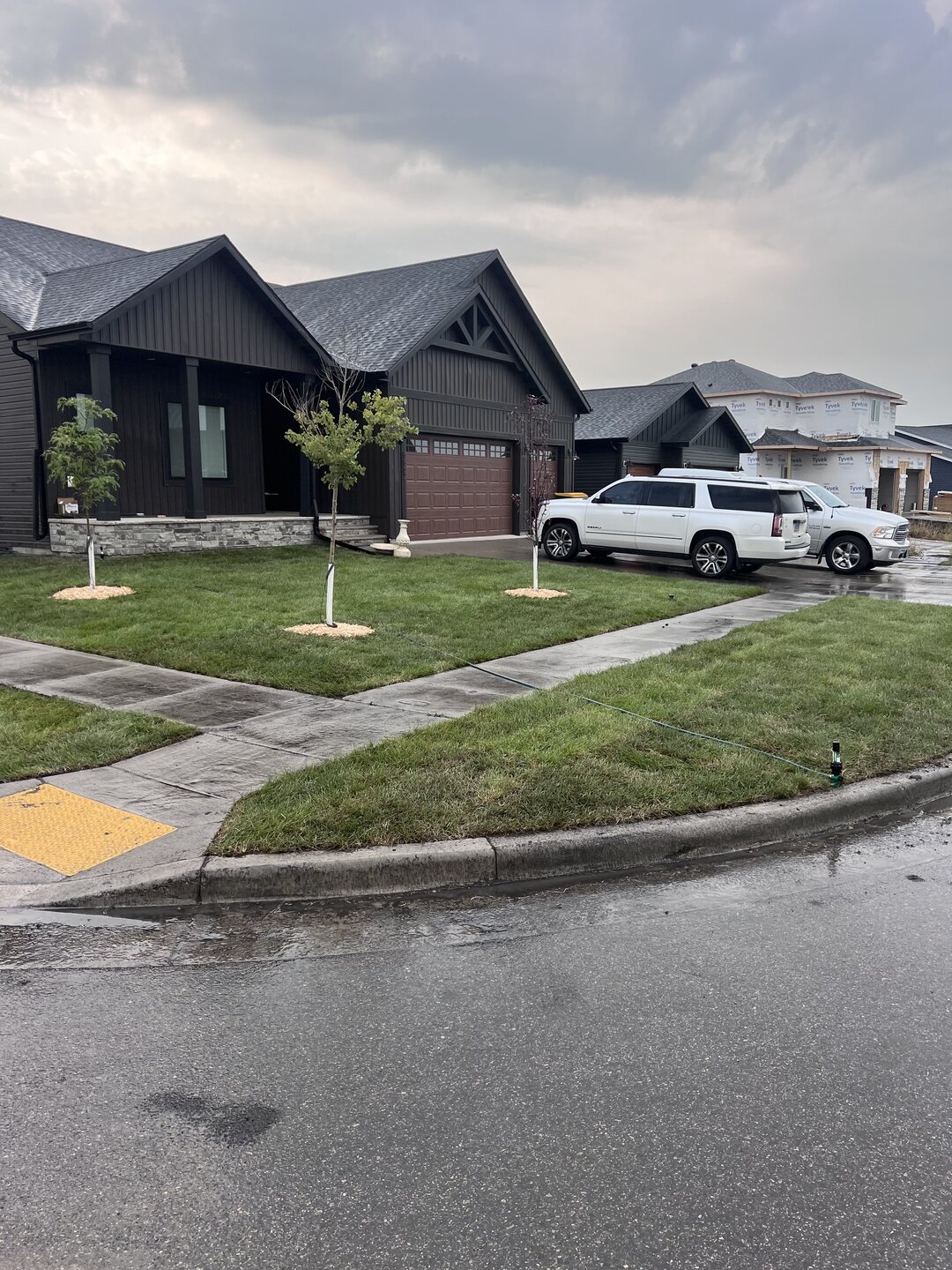 Completed sod installation at a West Fargo home by Perfect Turf